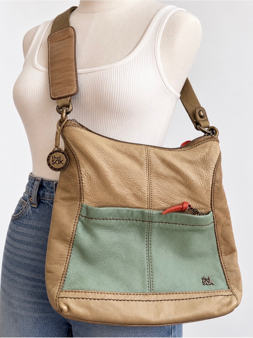 The Sak Beige and Sage Leather Crossbody Bag with Red Accent